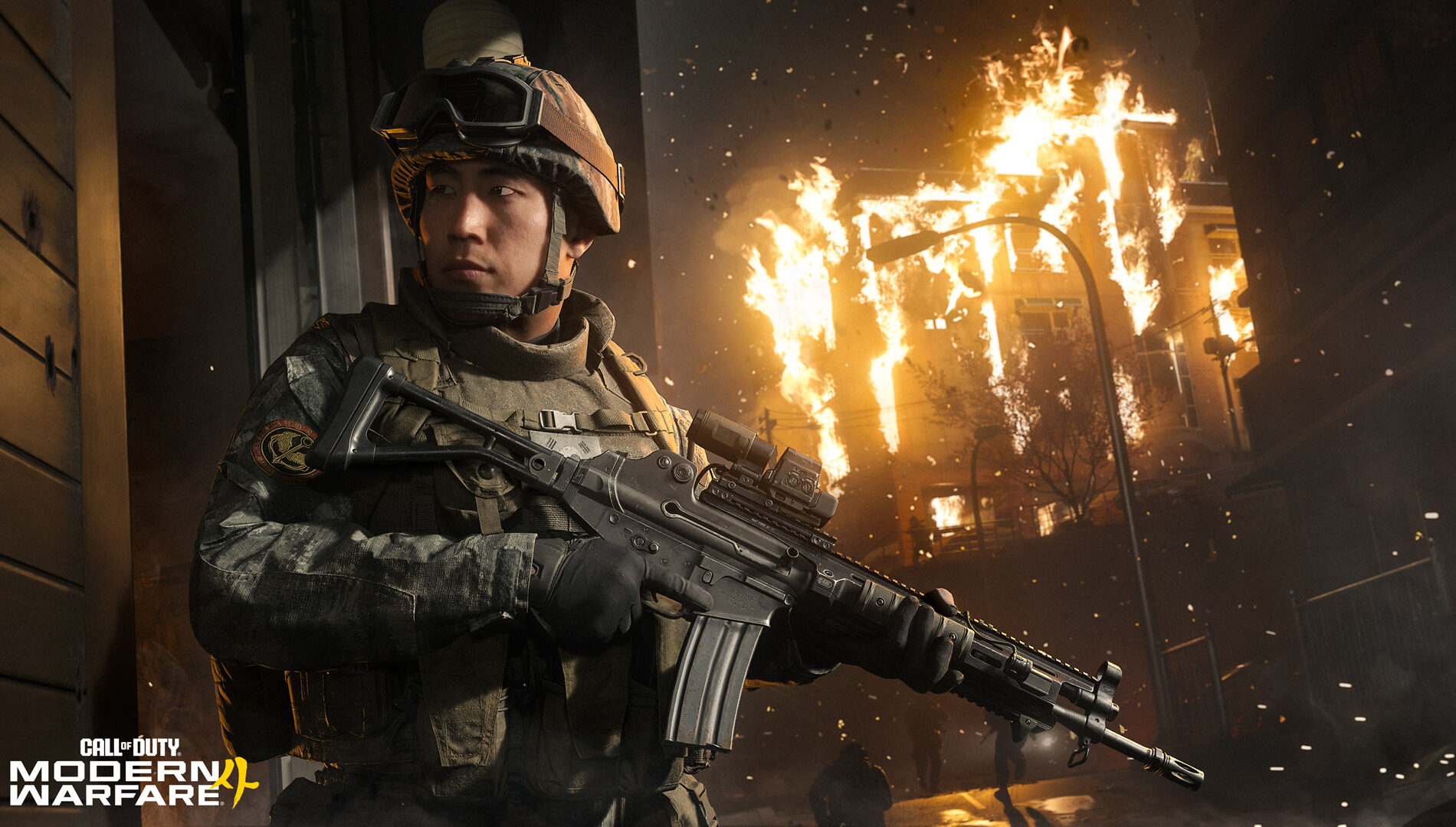 Soldato sudcoreano armato davanti a un incendio nell'immagine ufficiale della campagna di Modern Warfare 4